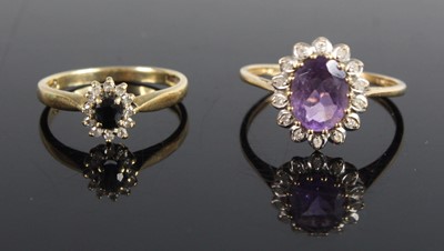 Lot 439 - A modern 9ct gold, sapphire and diamond flower...