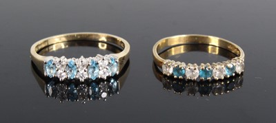 Lot 441 - A modern 9ct gold and cz set dress ring, size...