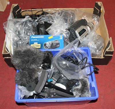 Lot 670 - A box of video cameras and related equipment...