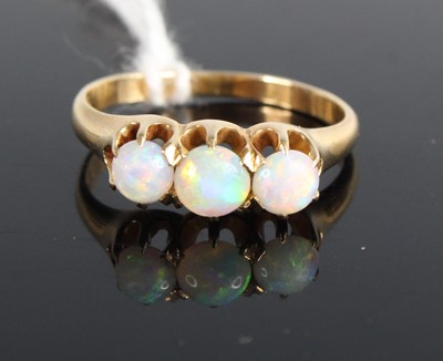 Lot 442 - A 14ct gold and opal three-stone ring, 3g, size M