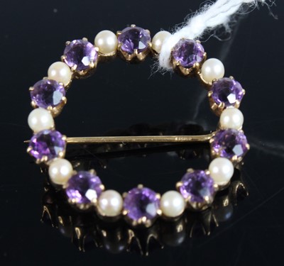 Lot 444 - A 9ct gold, amethyst and seed pearl set ring...