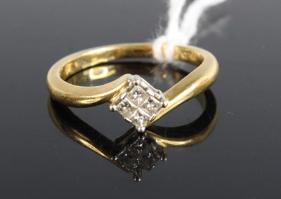 Lot 446 - A modern 18ct gold diamond crossover ring,...
