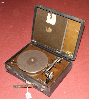 Lot 671 - A His Master's Voice portable wind-up...