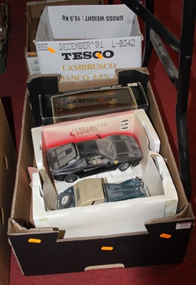 Lot 674 - Two boxes of model cars to include a Maisto...