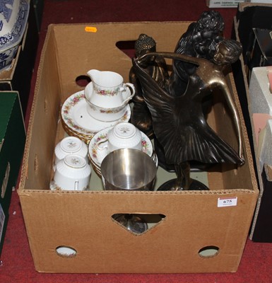 Lot 675 - A bronzed metal figure of a ballerina height...