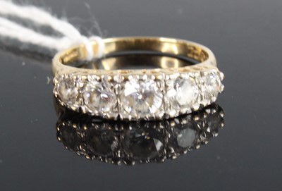 Lot 453 - A modern 14ct gold and cz set five-stone ring,...
