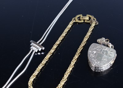 Lot 457 - A Christian Dior gold plated bracelet;...