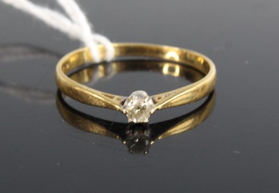 Lot 461 - An 18ct gold diamond solitaire ring, the claw...