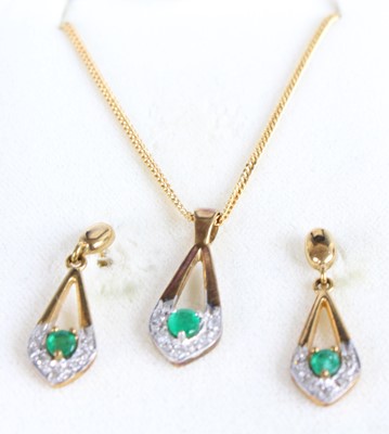 Lot 468 - A modern 9ct gold, emerald and diamond set...