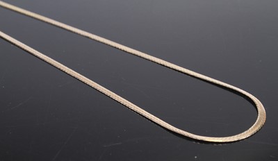 Lot 475 - A modern 9ct gold flat snake link necklace,...