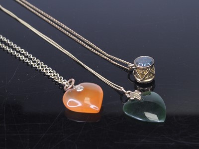 Lot 476 - A carved and polished nephrite heart shaped...