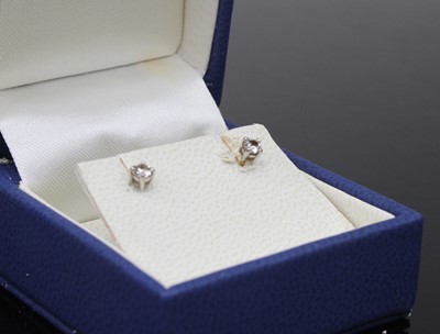 Lot 480 - A pair of 9ct gold diamond ear studs, the four-...