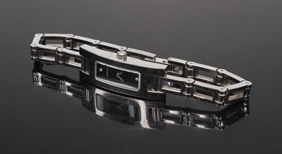 Lot 496 - A lady's Gucci polished steel fashion watch,...