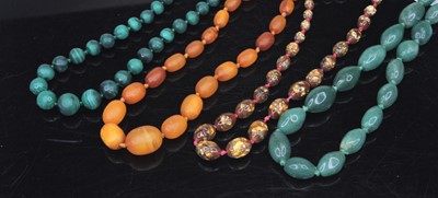 Lot 497 - A beaded malachite necklace; together with a...