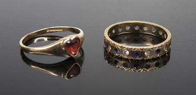 Lot 501 - A 9ct gold garnet set dress ring, size M;...