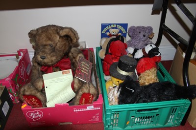 Lot 613 - Two boxes of bears and soft toys to include...
