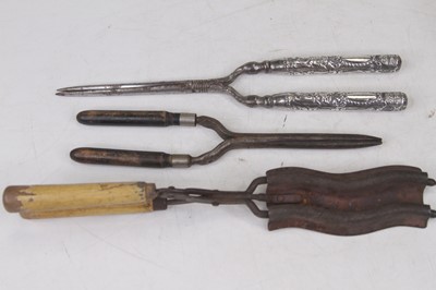 Lot 578 - A pair of Victorian curling tongs, having...