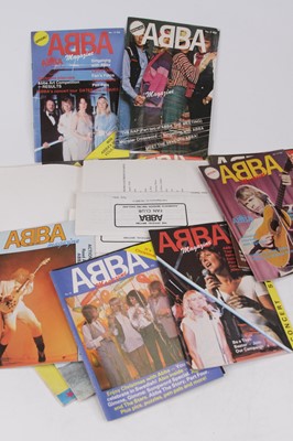 Lot 581 - A collection of ABBA memorabilia to include...