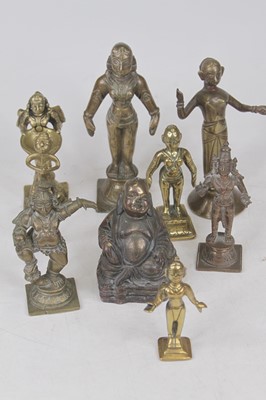 Lot 583 - A collection of eight Indian cast bronze and...