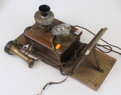Lot 625 - A vintage wall mounted rotary telephone (a/f)