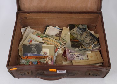 Lot 629 - A vintage brown leather suitcase containing a...