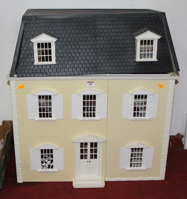 Lot 684 - A modern dolls house in the style of a...