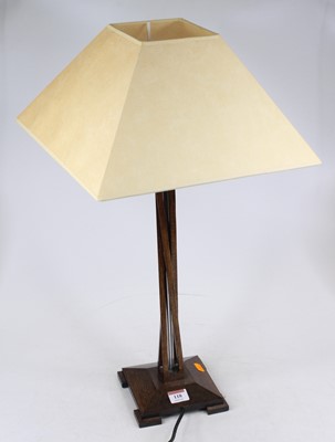 Lot 118 - A modern oak table lamp, of wrythen...