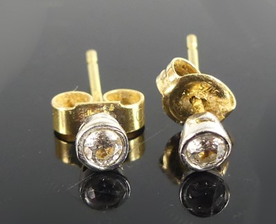 Lot 2614 - A pair of 18ct yellow and white gold diamond...