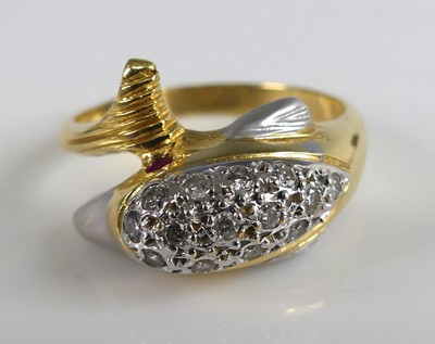Lot 2589 - A yellow and white metal dolphin crossover...