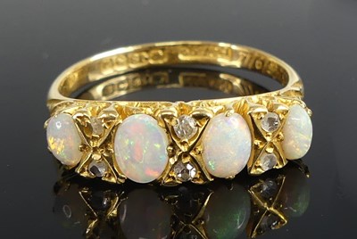 Lot 2593 - An 18ct yellow gold, opal and diamond half...