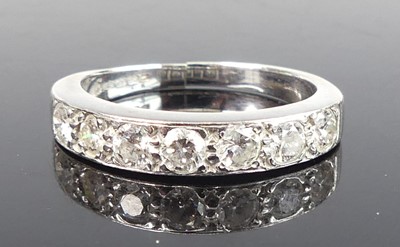 Lot 2627 - A contemporary 18ct white gold diamond half...