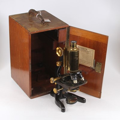 Lot 13 - A 20th century lacquered brass and iron...