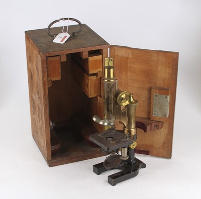 Lot 17 - An early 20th century lacquered brass and iron...