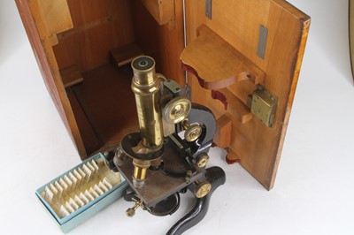Lot 18 - An early 20th century American lacquered brass...