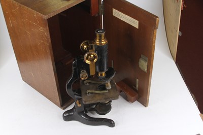 Lot 23 - A 20th century lacquered brass and iron...