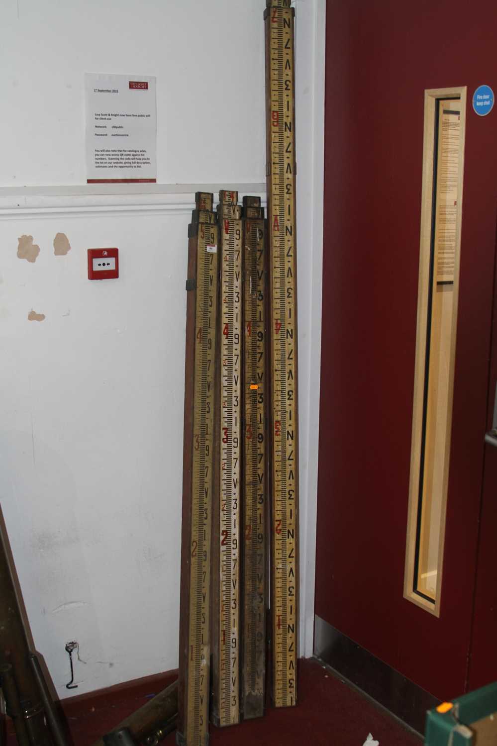 Lot 80 - A collection of four wooden, brass mounted and...