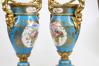 Lot 81 - A pair of late 19th century Servres style gilt...