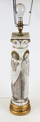 Lot 95 - A porcelain column shaped table lamp in the...