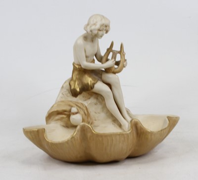 Lot 117 - A Royal Dux porcelain figural dish in the form...