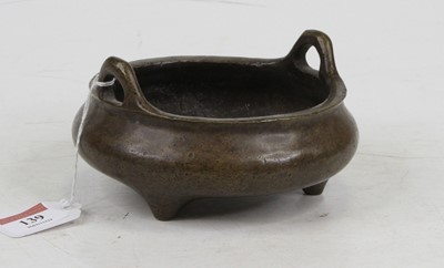 Lot 139 - A Chinese bronze censor of squat circular form...
