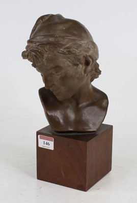 Lot 146 - A painted pottery head & shoulders portrait...