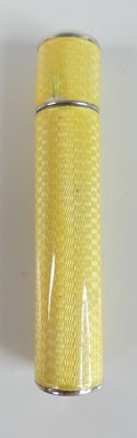 Lot 595 - An Art Deco silver and yellow guilloche enamel...