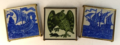 Lot 534 - A set of three earthenware tiles in the style...