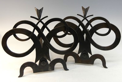 Lot 637 - After a design by Gilbert Poillerat - a pair...