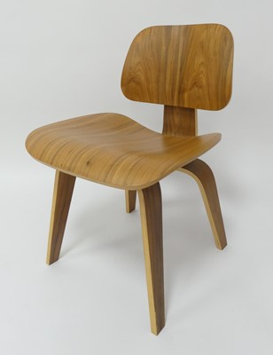 Lot 830 - After Charles & Ray Eames - an LCW plywood and...