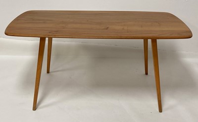 Lot 802 - A 1960s Ercol blond elm Windsor 382 dining...