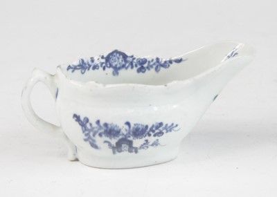 Lot 2037 - A Lowestoft blue and white porcelain butter...