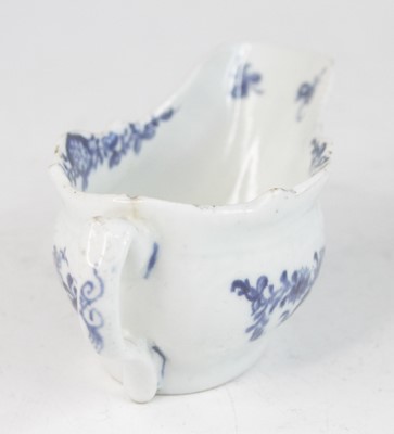 Lot 2037 - A Lowestoft blue and white porcelain butter...