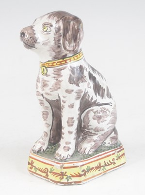 Lot 2030 - A Delft or Faience polychrome model of a dog,...