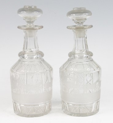 Lot 2052 - A pair of glass decanters, early 19th century,...